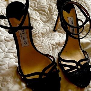 Black Jimmy Choo pumps​​